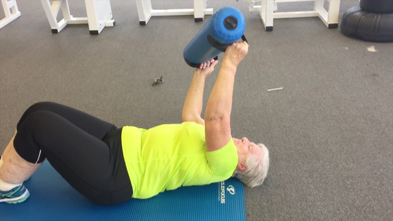 Joan doing strength training to reduce arthritis pain